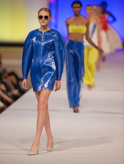 Gorgeous woman walk the runway in edgy fashions designed by UC students.