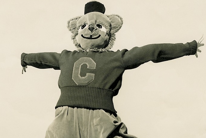 Bearcat Mascot from 1950s leaps into air.