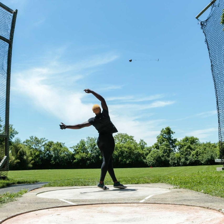 Echikunwoke demonstrates a hammer throw (3 of 3)