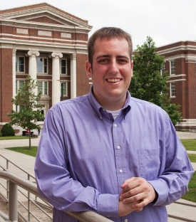 Alum Sean McCabe stands on campus.