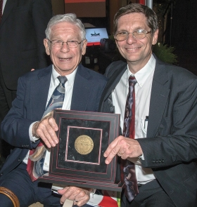 Dr. Joseph Broderick, who received the William Howard Taft Medal for Notable Achievement, sits with his father, Dr. Joseph Broderick.
