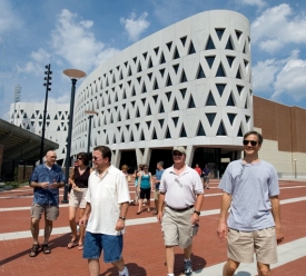  Lots of wow's echoed across UC's main campus in the summer of 2007 when 14 alumni from the '70s came by. Bernie Joyce, A&S '77 MBA '83, had requested the tour for a group of friends coming to an informal reunion. ''It wouldn't have been the same celebration without the tour; it was fantastic,'' he says. ''It gave us an opportunity to remember things we hadn't thought about in 30 years.'' Leaving the Richard Lindner Center (from left) are Bill Pickens, A&S '77; Nancy Coyne, wife of Joe Coyne, A&S '77, MA (A&S) '79 (not pictured); Bernie Joyce, father of Megan Joyce, A&S '06 (not pictured); Joel Palin, A&S '81; and Joe Haas, Bus '77.