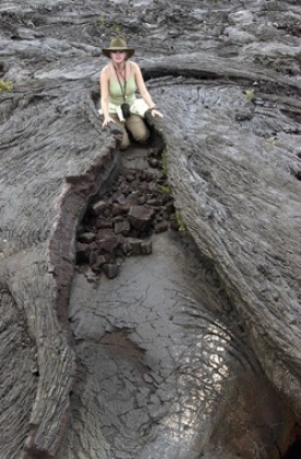 Earning academic credit by exploring old lava flows of Hawaiian volcanoes in 2002, Keri Craven, MS (A&S) '03, was testing geological theories she initially studied in class. After collecting samples, she analyzed them back on campus in the lab. Assisting her were Tammie Gerke, MS (A&S) '90, PhD (A&S) '95, and Lisa Fay, A&S '03.  photo/Lisa Ventre