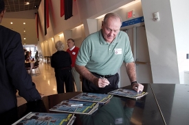 Former Bearcat Bob Wiesenhahn signs the Sports Illustrated cover